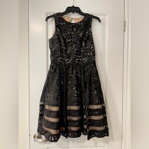 Beautiful gown worn two three times only. Might need gentle wash. Class & chic.